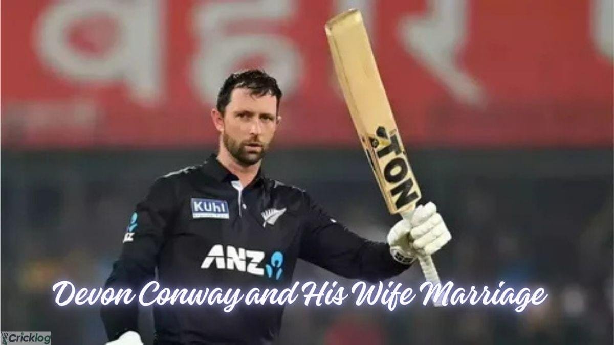 Devon Conway raising bat during cricket match