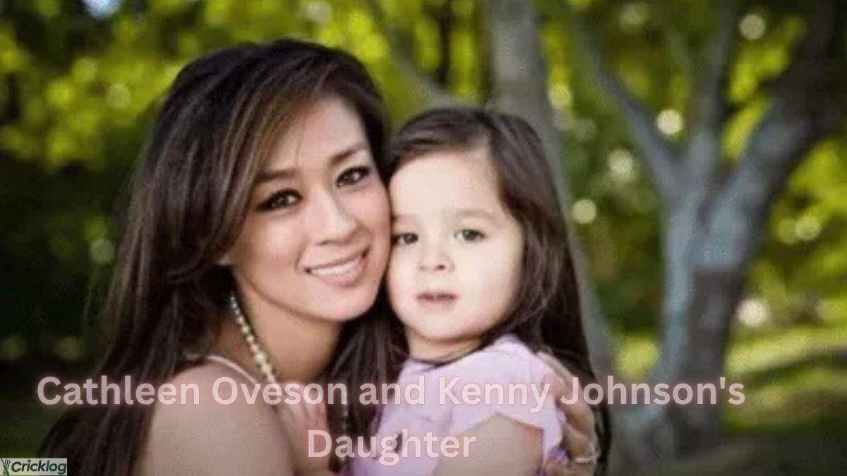 Cathleen Oveson with Kenny Johnson’s daughter