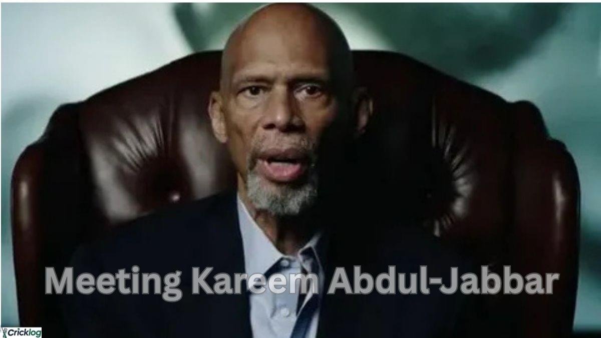Kareem Abdul-Jabbar sitting in a leather chair